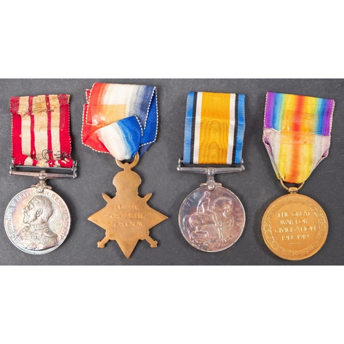 326 - A WWI group of four to '218210 H C Nieass Po RN', George V Naval General Service Medal with Persian ... 