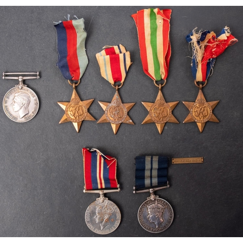 354 - A WWII Minesweeping Distinguished Service Medal  group of seven to 'J114281 P Beer PO', George VI DS... 