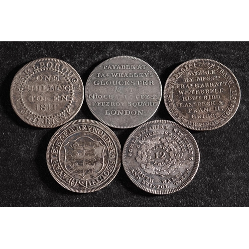 40 - Five 19th Century silver shilling tokens including Norfolk, Marlborough, Bristol etc.