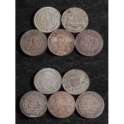 42 - Five 19th Century silver shilling tokens, including Worcester, Frome, Bristol, Birmingham and Shafte... 