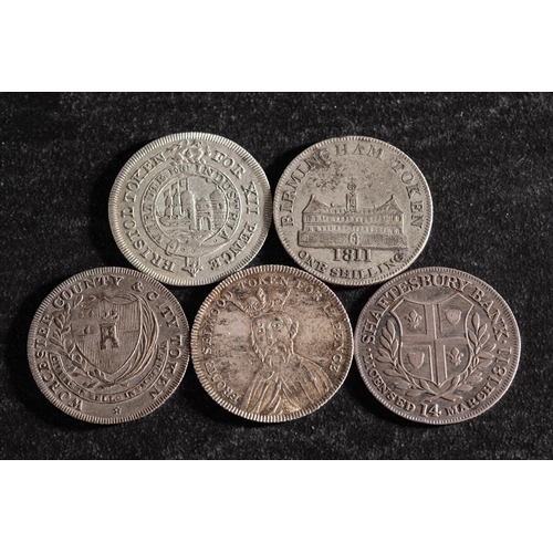 42 - Five 19th Century silver shilling tokens, including Worcester, Frome, Bristol, Birmingham and Shafte... 