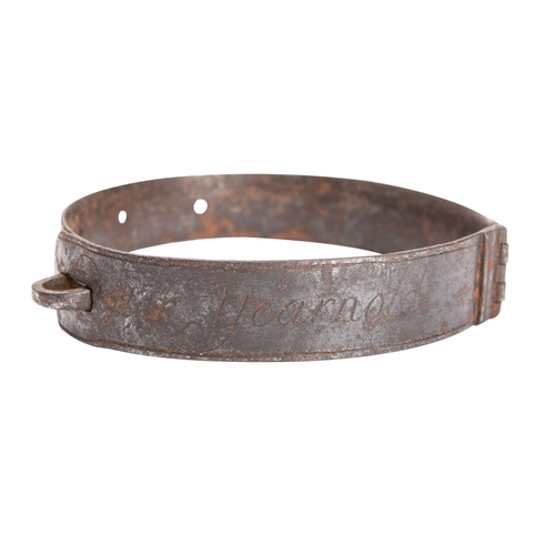 429 - A George II iron dog collar , inscribed 'Potter Yearnold. Bromsgrove 1731', 10cm diameter