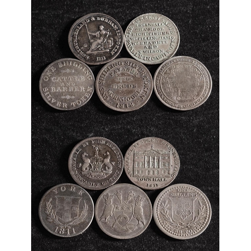 43 - Five 19th Century silver shilling tokens, including Leeds, Workhouse, Newark, Derby, York and Northu... 