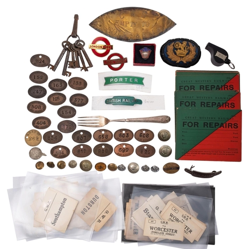 432 - A collection of raliwayana, including  GWR and BR copper Pay Check Tokens, buttons , enamel shoulder... 