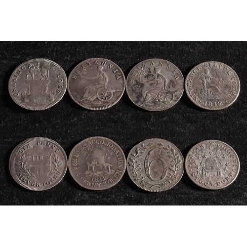 46 - Four 19th Century silver sixpence tokens including Stockport, Charing Cross and two Britannia.