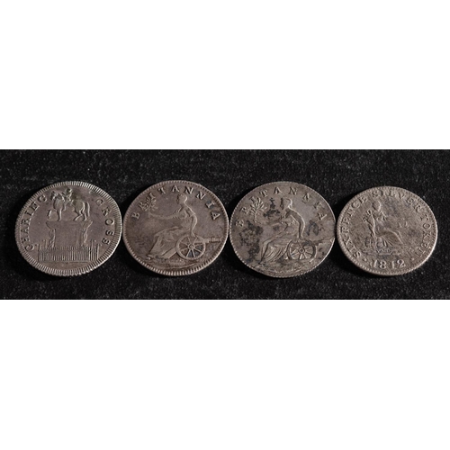 46 - Four 19th Century silver sixpence tokens including Stockport, Charing Cross and two Britannia.