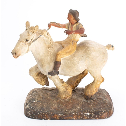 500 - A plaster figure of a man on a Shire horse , modelled after W M Chance,  painted in colours on a nat... 