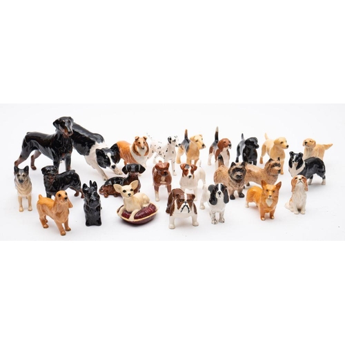 520 - Beswick Dogs; A large collection of twenty-four models of various sizes.