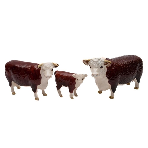 521 - Beswick Hereford Bull, Cow and Calf.