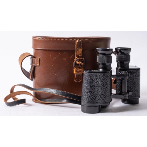 572 - A pair of Crystar 6x30 binoculars, maker Wray of London in fitted leather case.