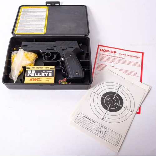 596 - A Kien Well (Taiwan) Sig Saver P226 Airsoft 6mm BB Gun, together with instructions in original case.