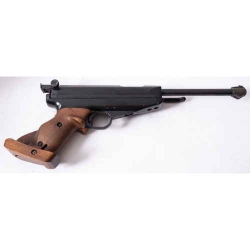 604 - A Feinwerkbau Mod 65 .177 calibre target air pistol, serial number 96214, with ergonomic wooden grip... 