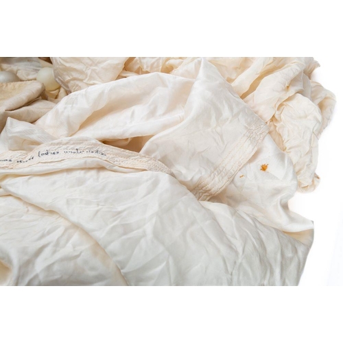 751 - Two section of WWII parachute silk, reputedly remnants  from silk used to make undergarments during ... 