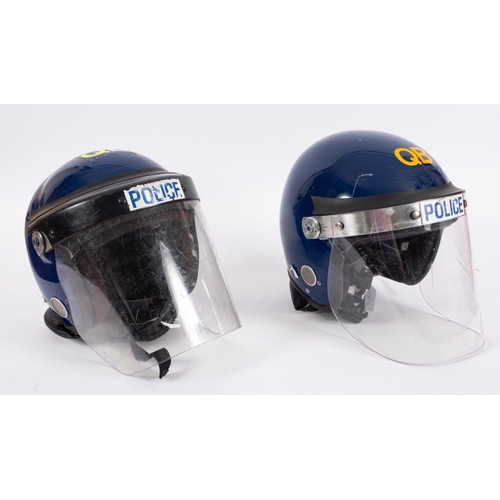 823 - A  British Police issue Guardian MKIII Public Order Helmet, together with a similar MLA 'Defender' h... 