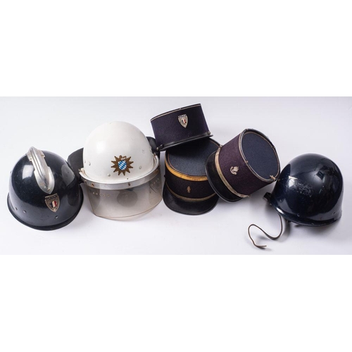 825 - Three French Police Kepis, together with a French Police steel helmet, and other French Police  helm... 