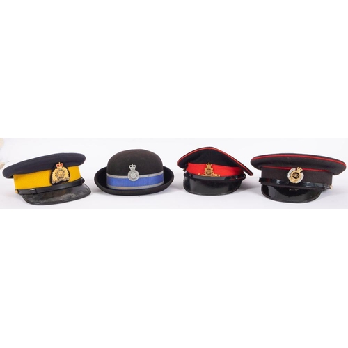 826 - A Royal Engineers peaked cap, together with a Royal Artillery peaked cap, RCMP cap and a Yorkshire C... 