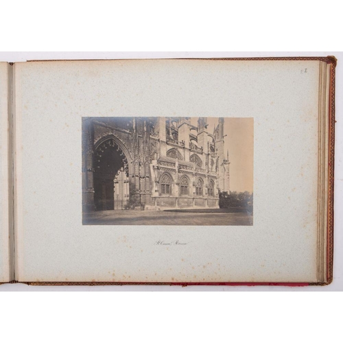 973 - France 1890. A red morocco album gilts tamped 'R G from L,La, T, B. 1890' containing fourteen whole-... 