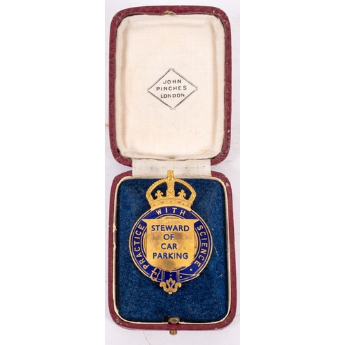 536 - A John Plinches gilt  and enamel' Steward of Parking' lapel badge, King's Crown over circular badge ... 