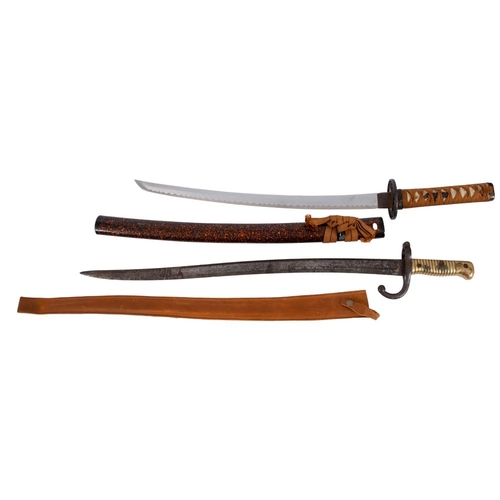 702 - A WWI period Chassepot bayonet in later leather scabbard, together with a reproduction wakizashi  (2... 