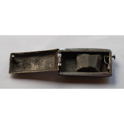 529 - An 18th century cut steel pocket tinder box, of rectangular form, slightly rounded long sides used a... 