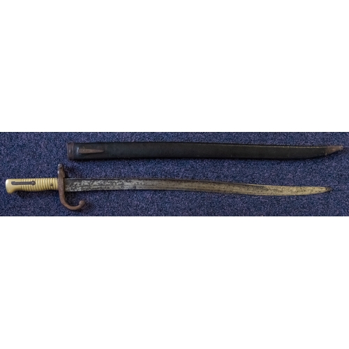 735 - A Chassepot bayonet,  the curved single edge, single fuller blade over  single quillon hilt and ribb... 