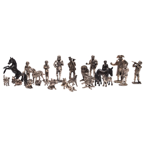 539 - Royal Hampshire, a collection of silvered pewter figures including animals and military