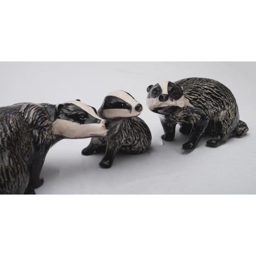 523 - A Royal Doulton Vietnamese Pot-bellied Pig and Piglet; together with Pigmy Goat, a clan of three Bes... 
