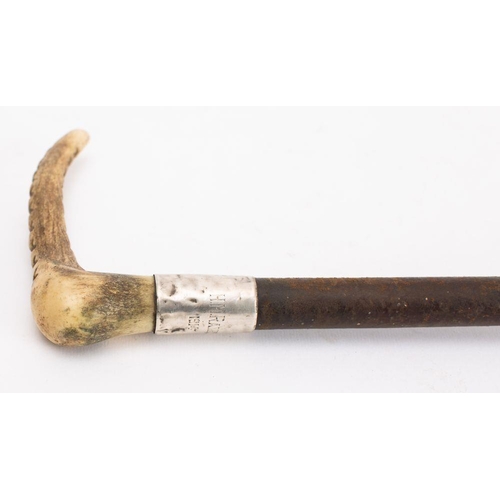 548 - An early 20th century silver mounted antler handled riding whip, maker MP, Birmingham 1911,  inscrib... 