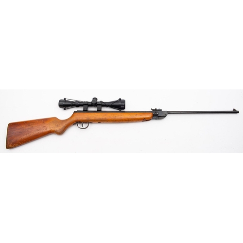 592 - A Haenel Model 308 .22 calibre air rifle serial number '420941, with plain semi pistol stock , fitte... 