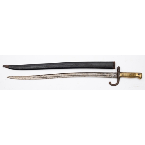 735 - A Chassepot bayonet,  the curved single edge, single fuller blade over  single quillon hilt and ribb... 