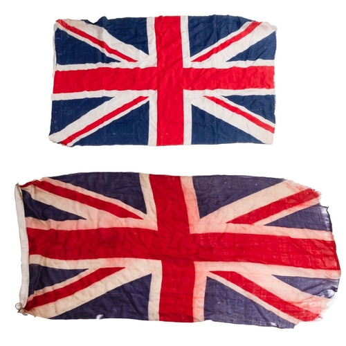 815 - A Flag of St. George, 85 x 127cm, together with two smaller Union Jack flags (3)