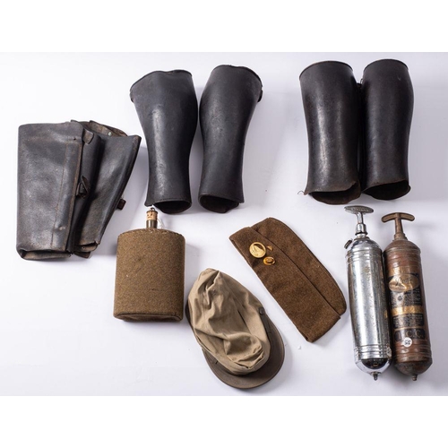 834 - A group of various militaria, including a Mk6A water bottle, there pairs of WWI black leather gaiter... 