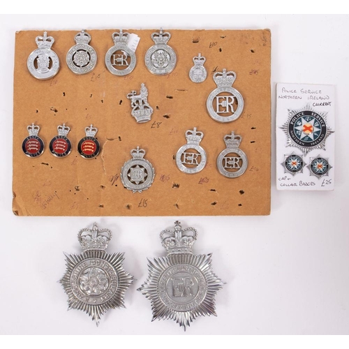 840 - A collection of various Police cap badges together with a Leicester  and Rutland helmet plate and a ... 