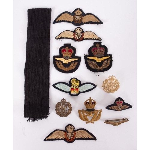 841 - A WWI RFC cap badge, together with a small collection of later RAF  cloth badges and patches.