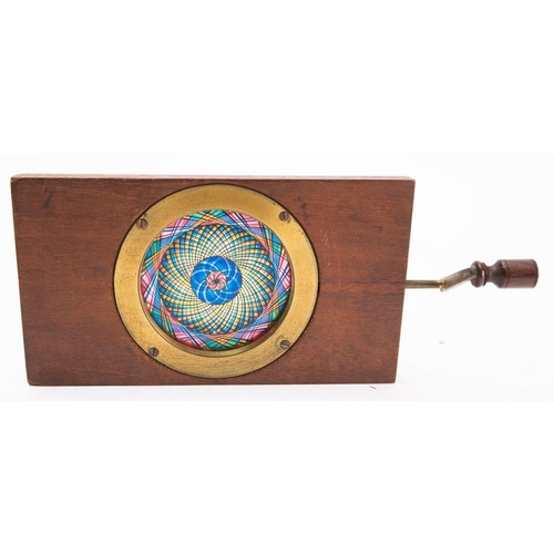 966 - A 19th century Chromotrope, unsigned, with blue, yellow, pink and black kaleidoscope effect. , 10 x ... 