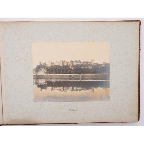 973 - France 1890. A red morocco album gilts tamped 'R G from L,La, T, B. 1890' containing fourteen whole-... 