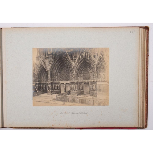 973 - France 1890. A red morocco album gilts tamped 'R G from L,La, T, B. 1890' containing fourteen whole-... 