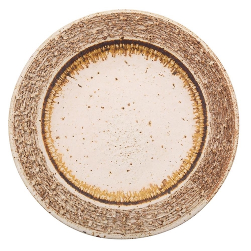 131 - A grogged stoneware charger, with deeply textured border under ivory glazes and a flown russet band,... 