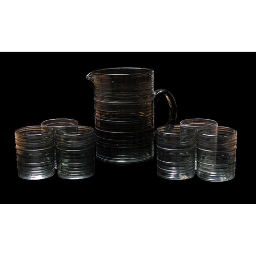 209 - Kaj Franck for Nuutajarvi a Rustica jug and six beakers, in smoke glass, jug 16cm high.