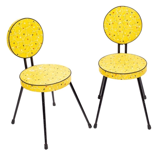 423 - A pair of yellow vinyl covered side chairs, possibly by Willy van der Meeren, circa 1950s; the circu... 