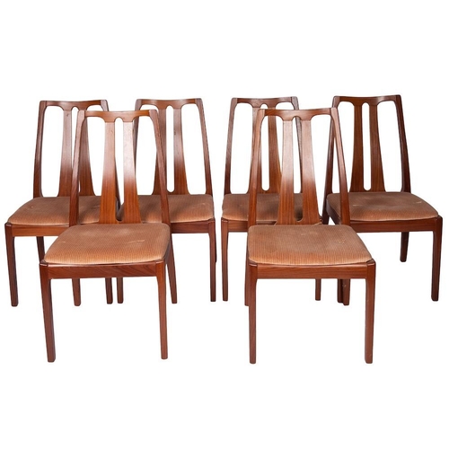 427 - A teak extending dining table and six chairs, by Nathan Furniture, in 1970s style, 1980s make; the o... 