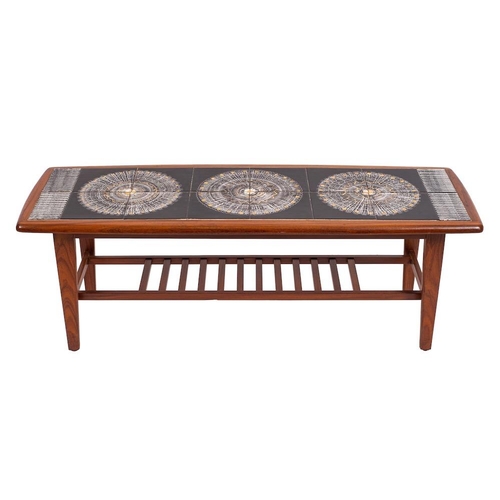 438 - A teak and tile topped coffee table, retailed by Heals, mid-20th century; the oblong top inset with ... 