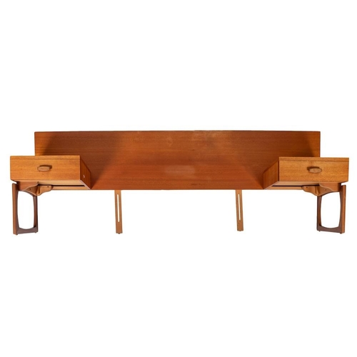 439 - A teak double bed headboard with integral side tables, by Kofod Larsen for G Plan, circa 1960s; the ... 