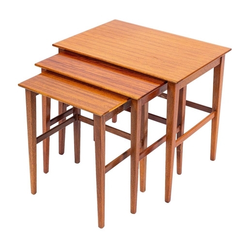 443 - A nest of three G-Plan teak occasional tables, circa 1960; of rectangular form, all with straight, t... 