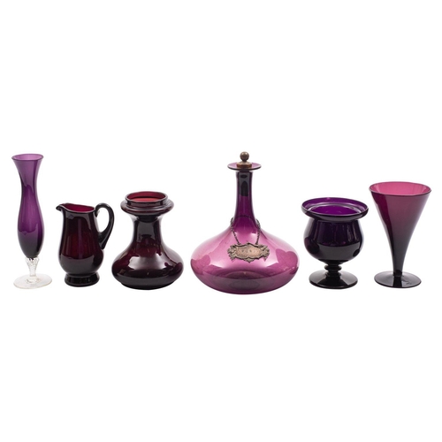 1 - A mixed group of amethyst coloured glass, including a ships decanter, wine glasses, glass coolers ju... 