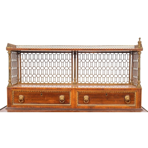 1027 - A Regency rosewood, inlaid and brass mounted Bonheur du Jour in the manner of John McLean, bordered ... 