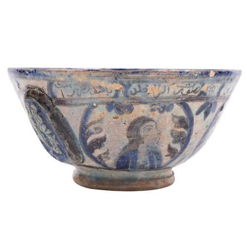 106 - A Persian pottery bowl decorated in blue and grey with bands and panels of portraits, inscriptions a... 