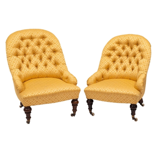 1060 - Two similar Victorian walnut frame nursing chairs, with curved upholstered stuff over button down ba... 