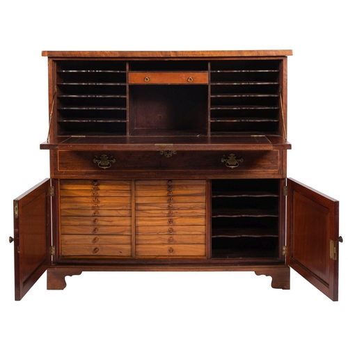 1095 - A 19th-century mahogany and inlaid typesetter's cabinet; bordered with sycamore lines, the hinged fa... 