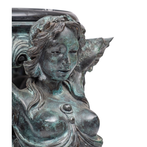 1202 - A verdigris patinated metal and marble mounted gueridon in the manner of a tripod Athenienne, of rec... 